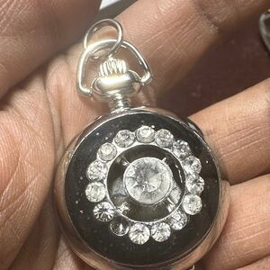 Avon vintage Silver and Black Watch with Crystals- one stone is missing